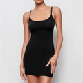 Black sleeveless sling dress with a short skirt and fitted sheath silhouette