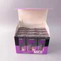 Two-in-one makeup primer and setting spray bottles in monochrome packaging