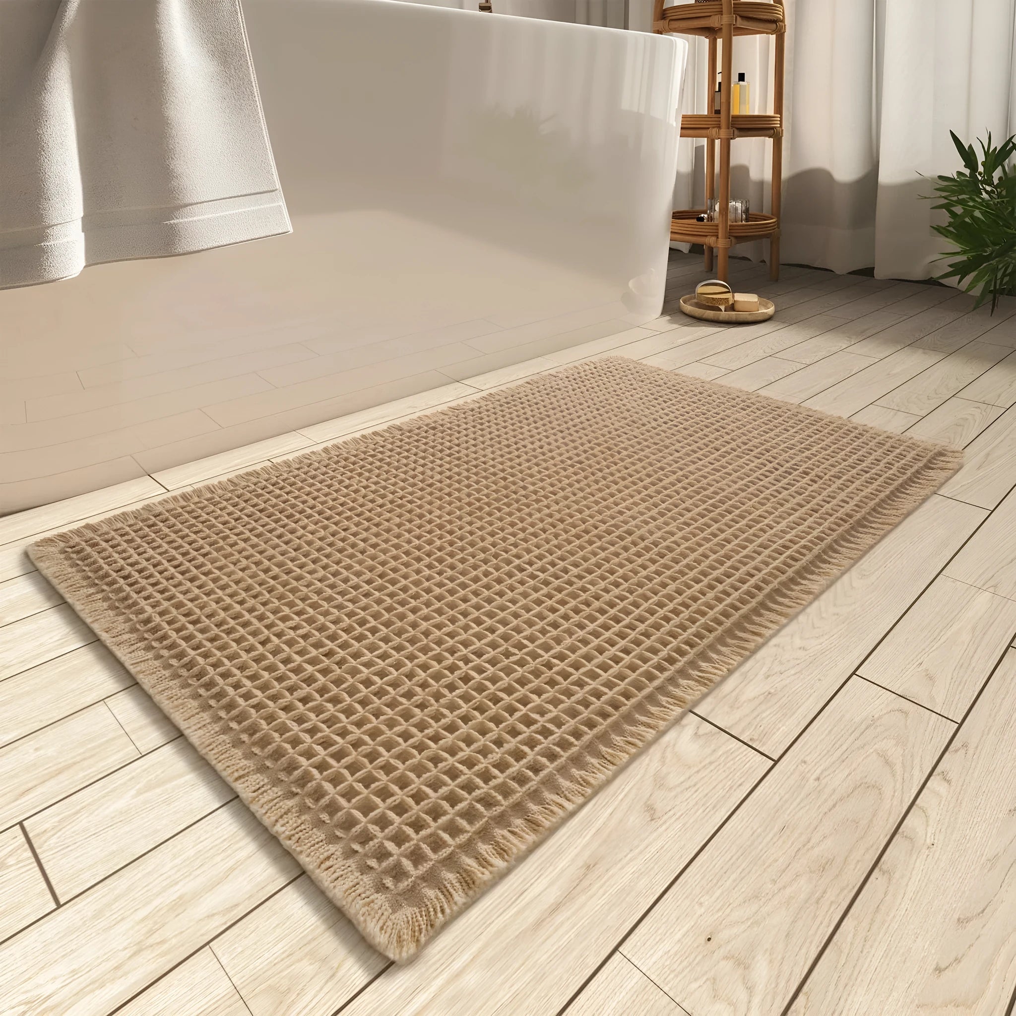 Modern checkered pattern absorbent non-slip bathroom floor mat in a neutral colour on tiled floor.