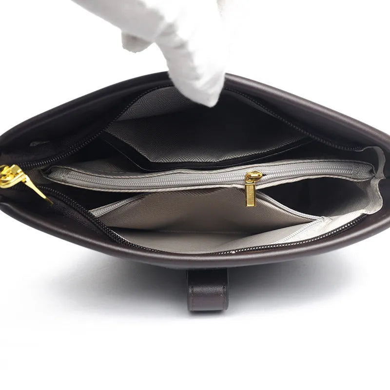 Korean style black soft PU bucket bag with double shoulder straps and multiple internal compartments