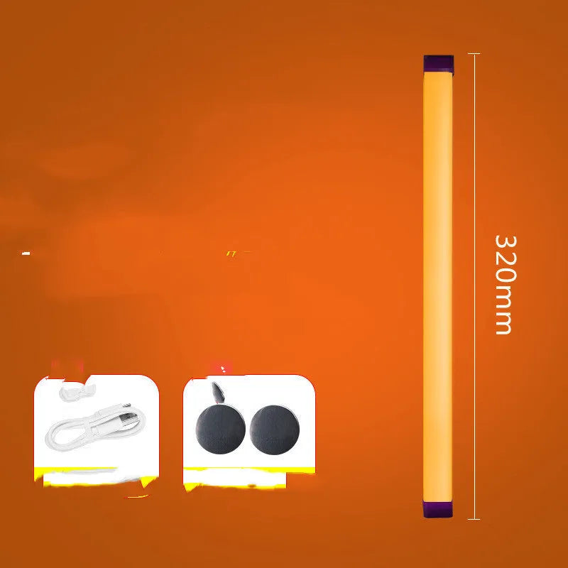 Rechargeable dimmable LED tube light in blue and purple colours shown in a bedroom setting.