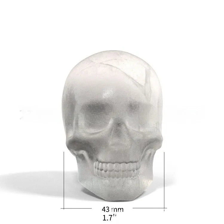 Halloween skull ice cube tray made from food-grade silicone measuring 5.8 by 8.5 by 7 cm