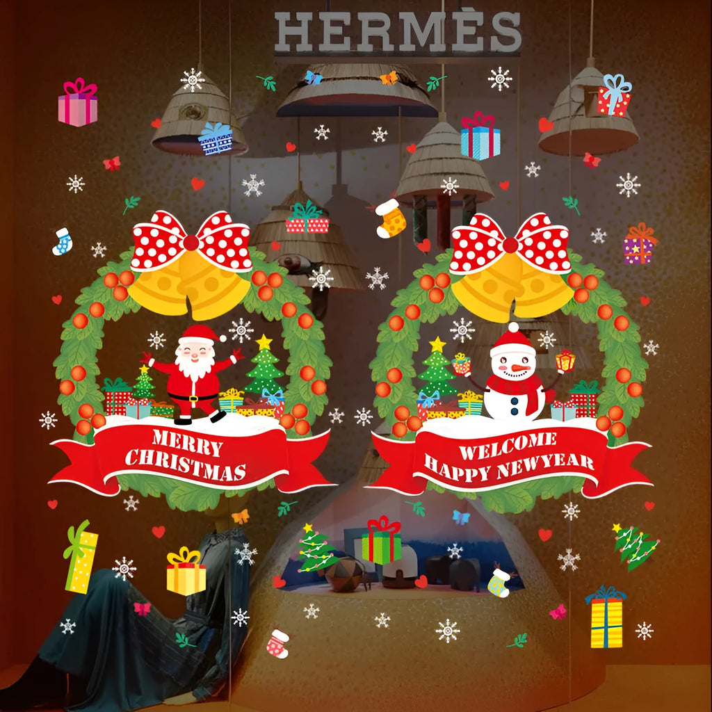 Two large colourful cartoon Christmas static cling stickers on a glass window.
