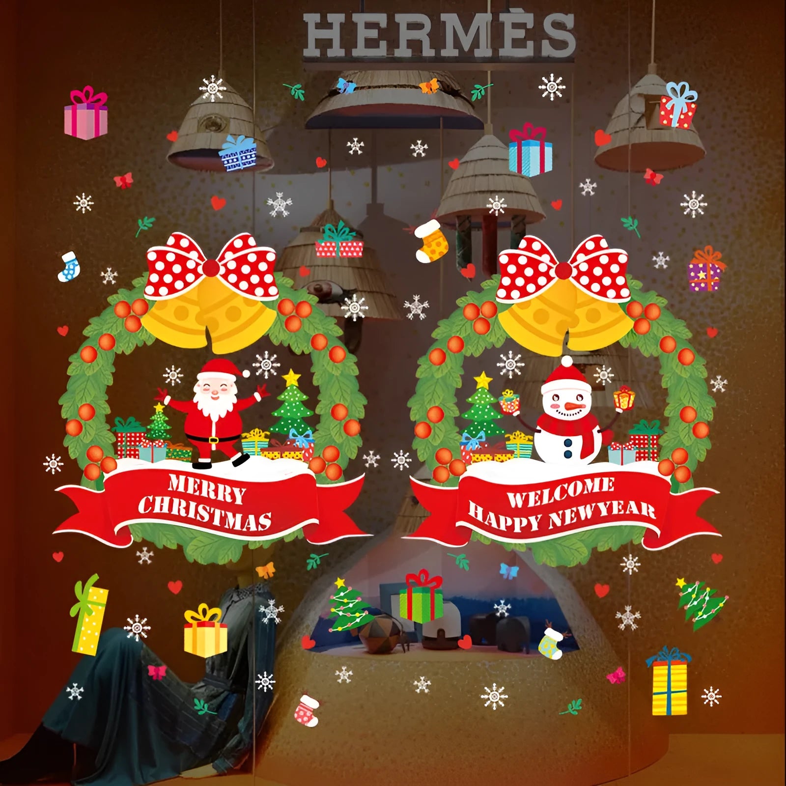 Two large colourful cartoon Christmas static cling stickers on a glass window.