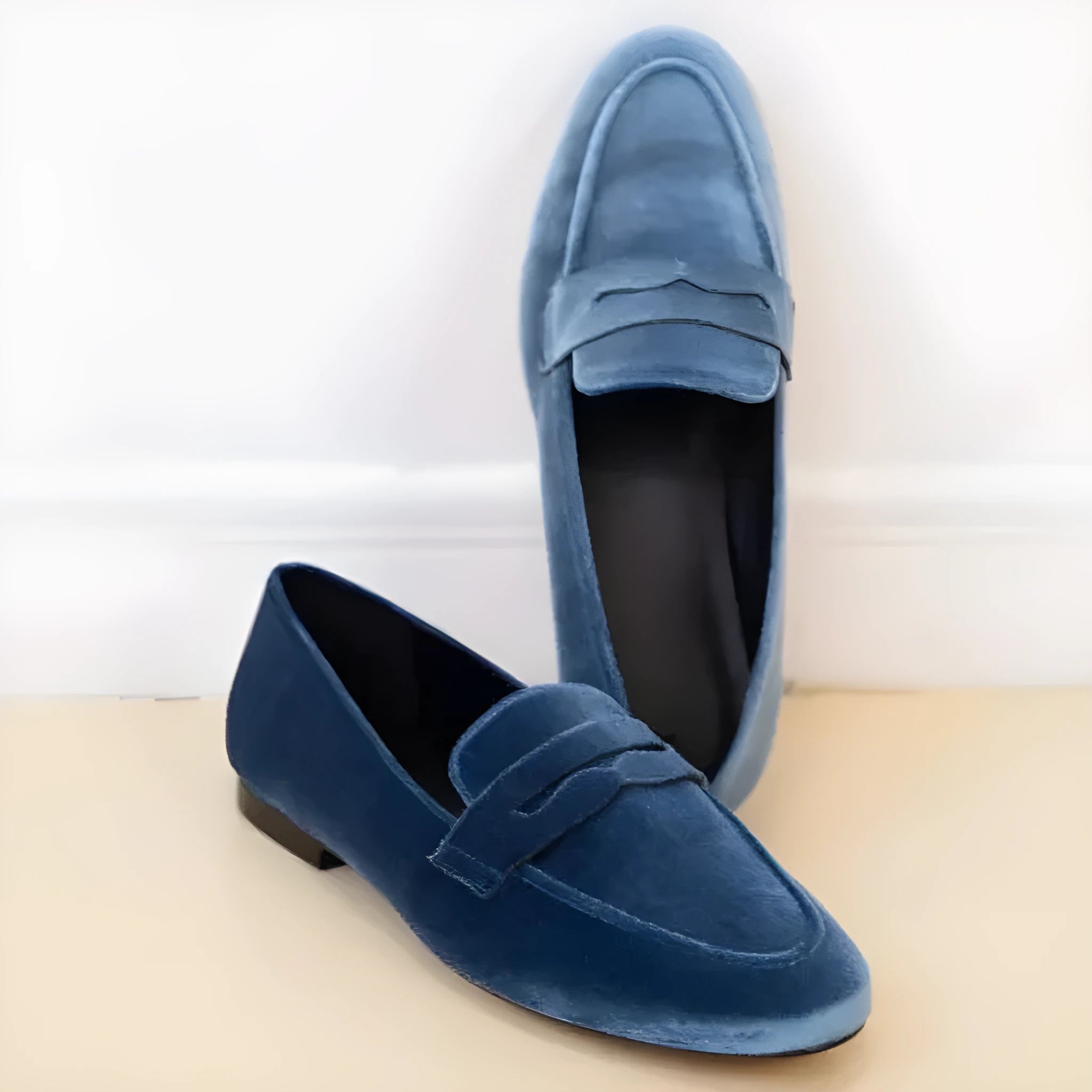 Blue and black sole suede loafers with round toe and slip-on design