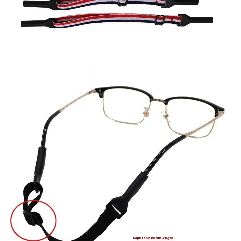 Black adjustable glasses cord with silicone earpiece tips shown on spectacles