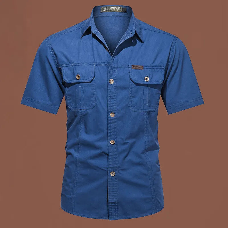 Men's short sleeve cotton work shirt in a loose fit, shown in army green colour.