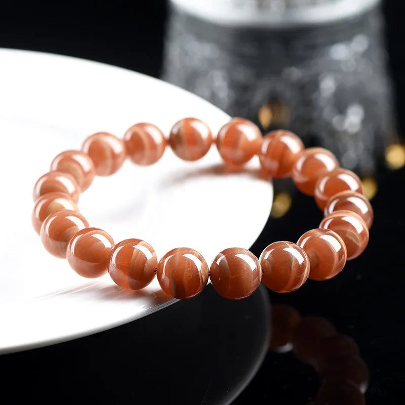 Natural rhodochrosite round bead bracelet from Peru in 6mm or 8mm size