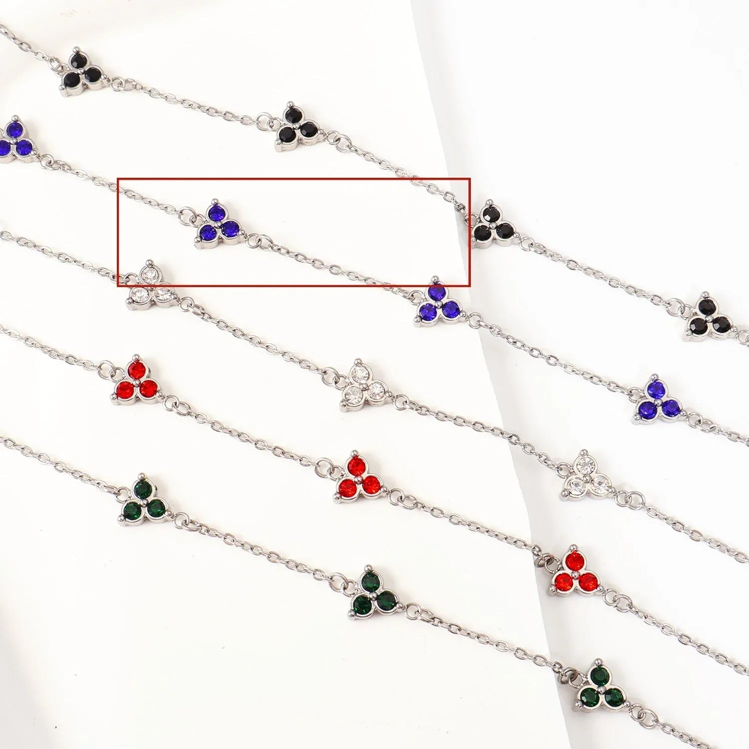 Women's geometric bracelet with triangular diamond cluster in gold or steel stainless steel with coloured stones
