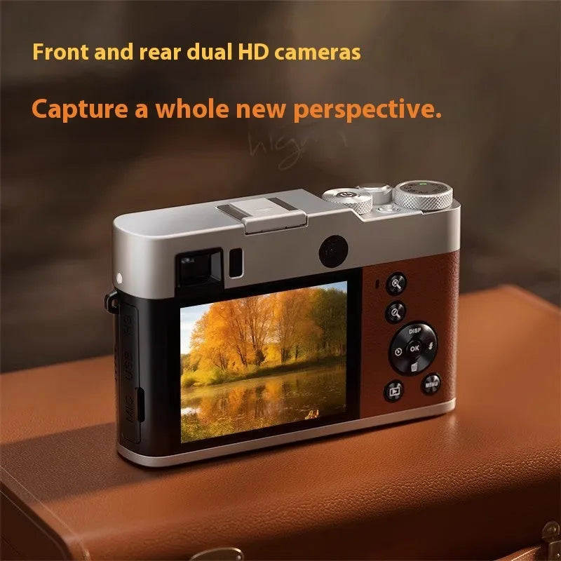 Black 5K digital camera with optical viewfinder and dual lenses on front and rear