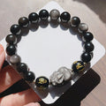Men's silver stone bracelet with Chinese zodiac designs and proverb beading in handcrafted traditional style