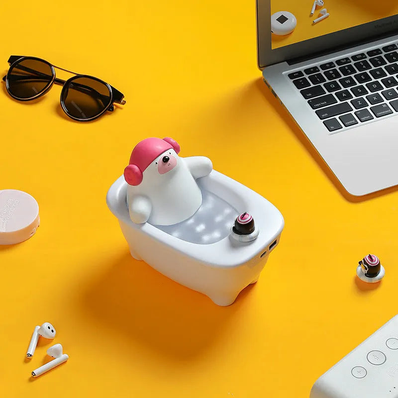 White polar bear-shaped USB air humidifier with water tank on a desk.
