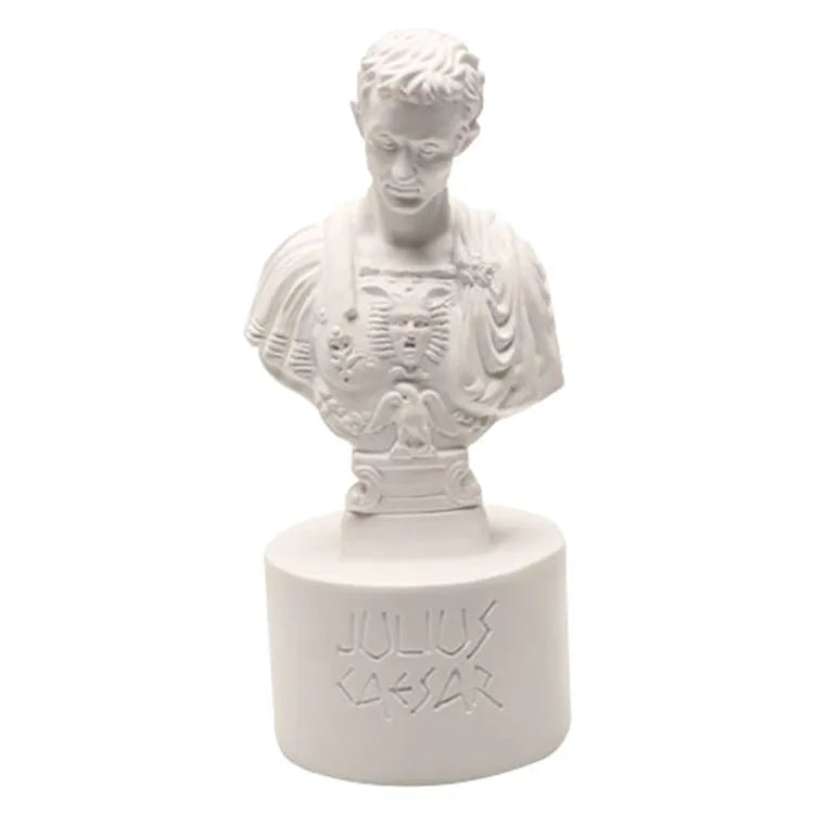 White synthetic resin pen holder with sculpted American creative character design on a desk.