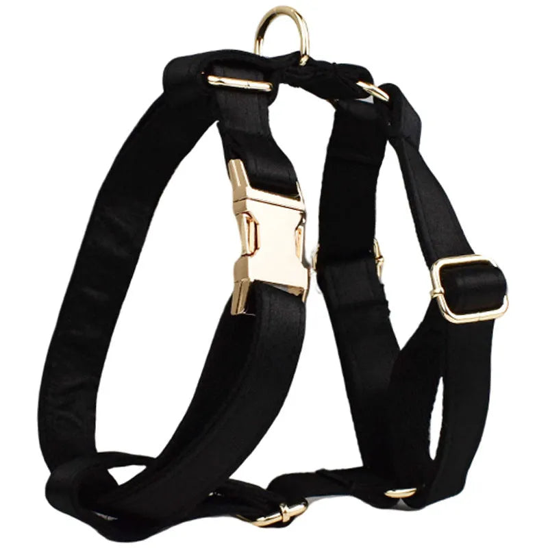 Complete cloth dog harness set including chest strap harness, collar, leash, decorative bow, and vest.