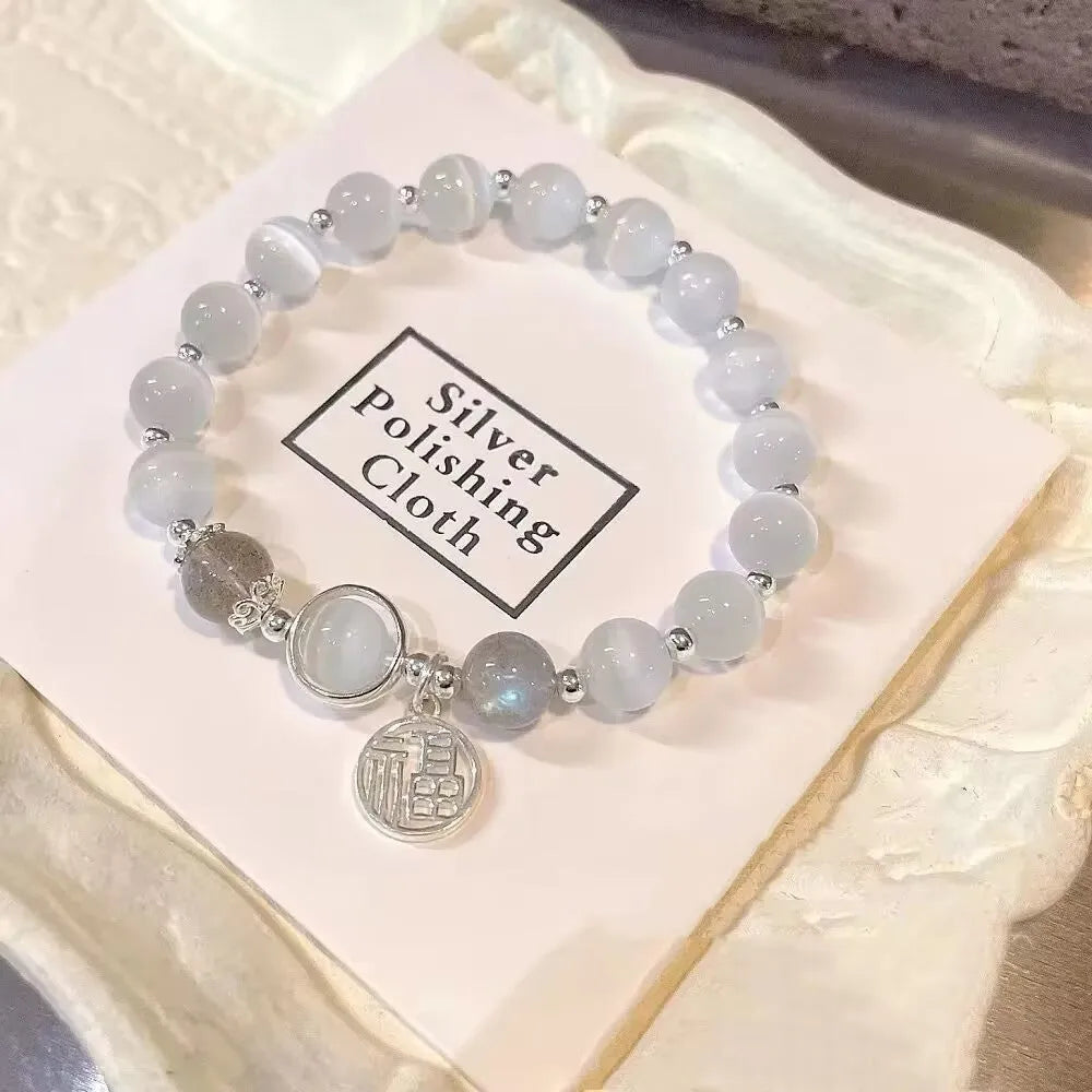 Handcrafted grey moonlight glass butterfly bracelet with coloured glaze beads and round charms