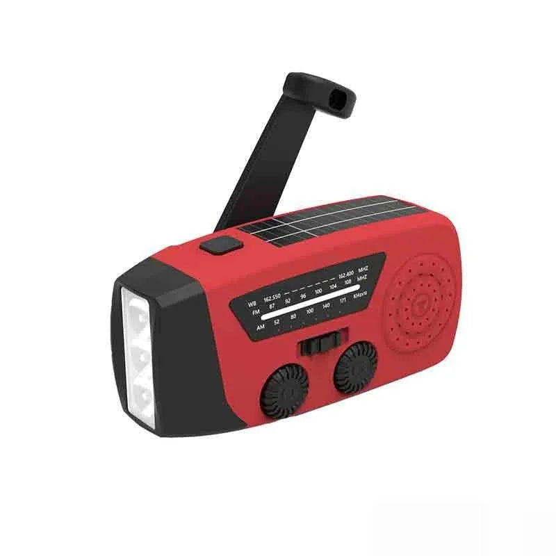 Red rechargeable hand radio torch with USB port and wrist strap on a white background.