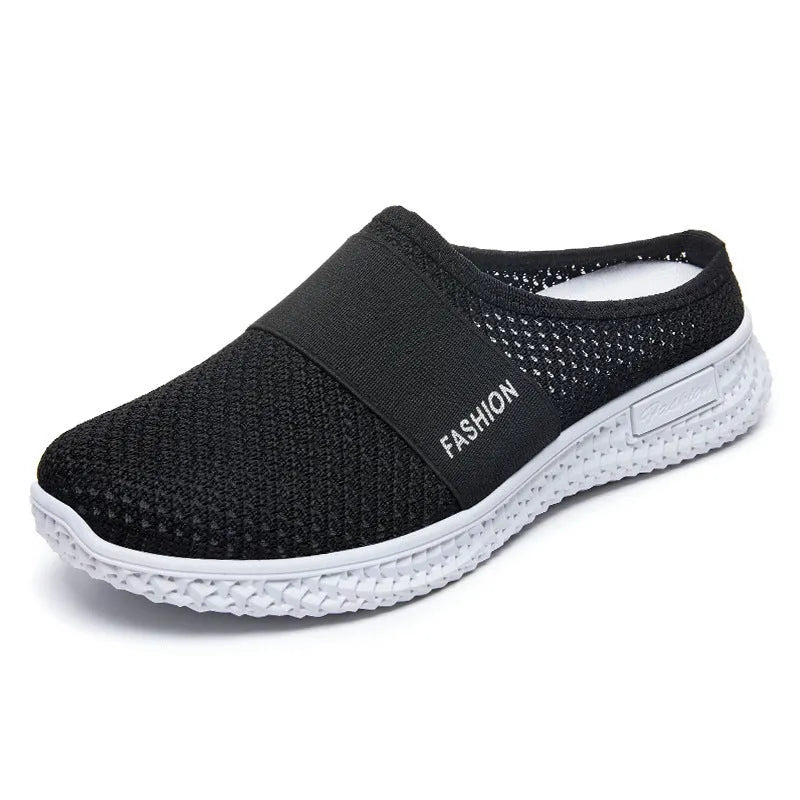 Women's breathable mesh casual shoes with flat heel, round toe, and hollow-out design in black, grey, pink, or purple.