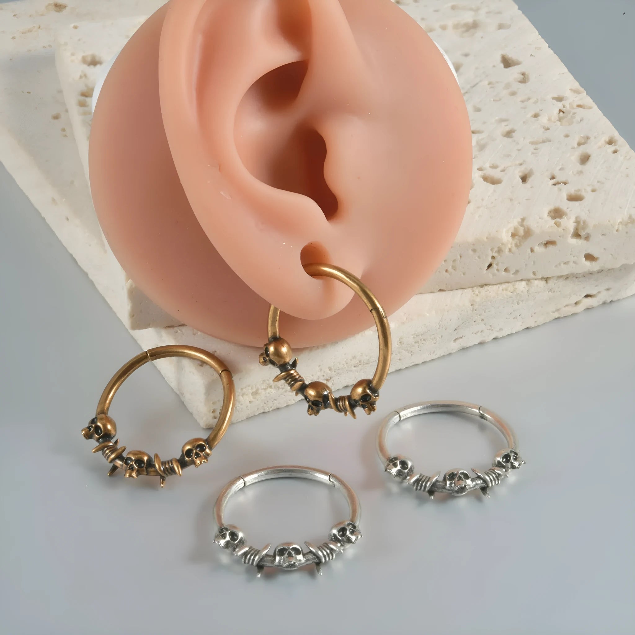 Punk copper earrings with vintage ghost head design in antique gold finish