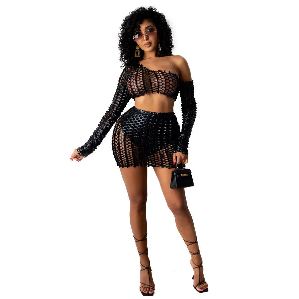 Women's hollow-out two-piece dress set with net hole detail on sleeveless top and short skirt