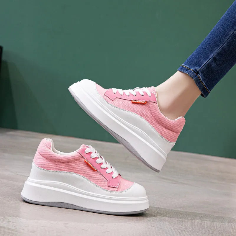 Women's beige leather thick-soled casual board shoes on a white background.
