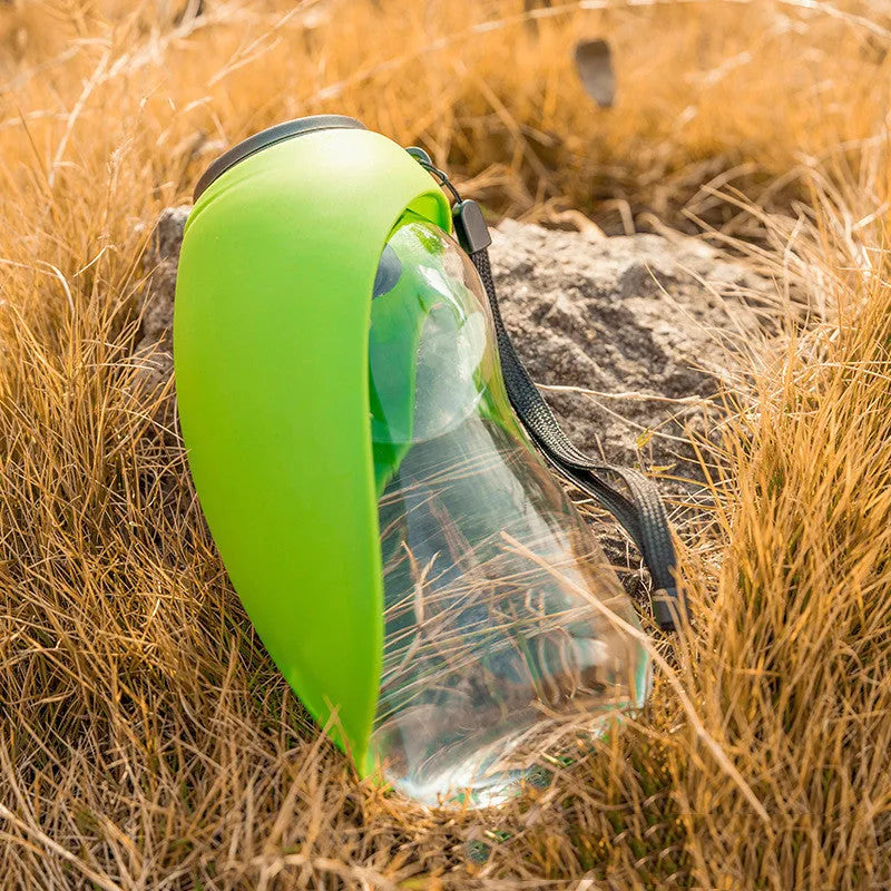 Portable pet water bottle with 680ml capacity showing key lock and wide drinking sink