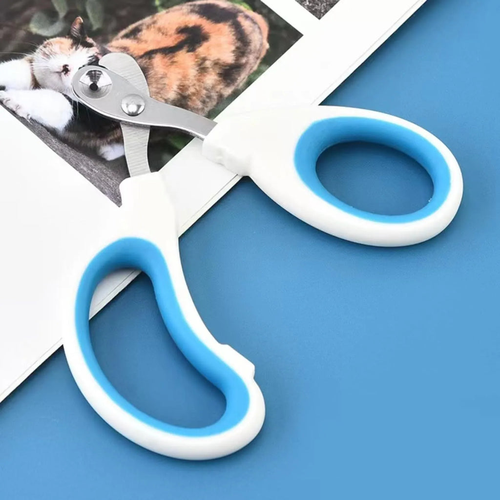 Blue pet nail clippers with circular safety hole and cushioned non-slip handle for trimming cat and bird nails.