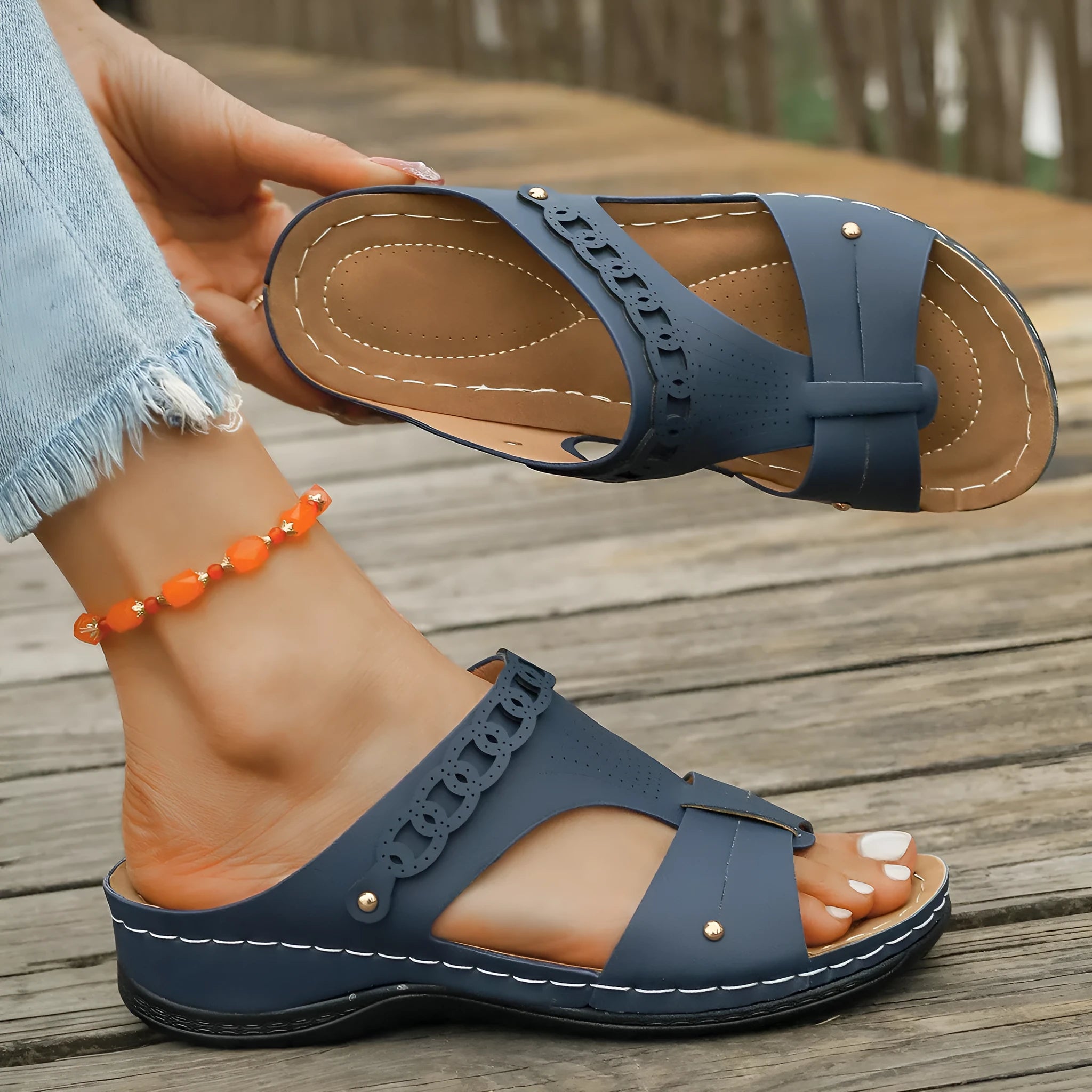 Women's Roman style slippers with slope heel and fish mouth toe design in PU upper and rubber sole