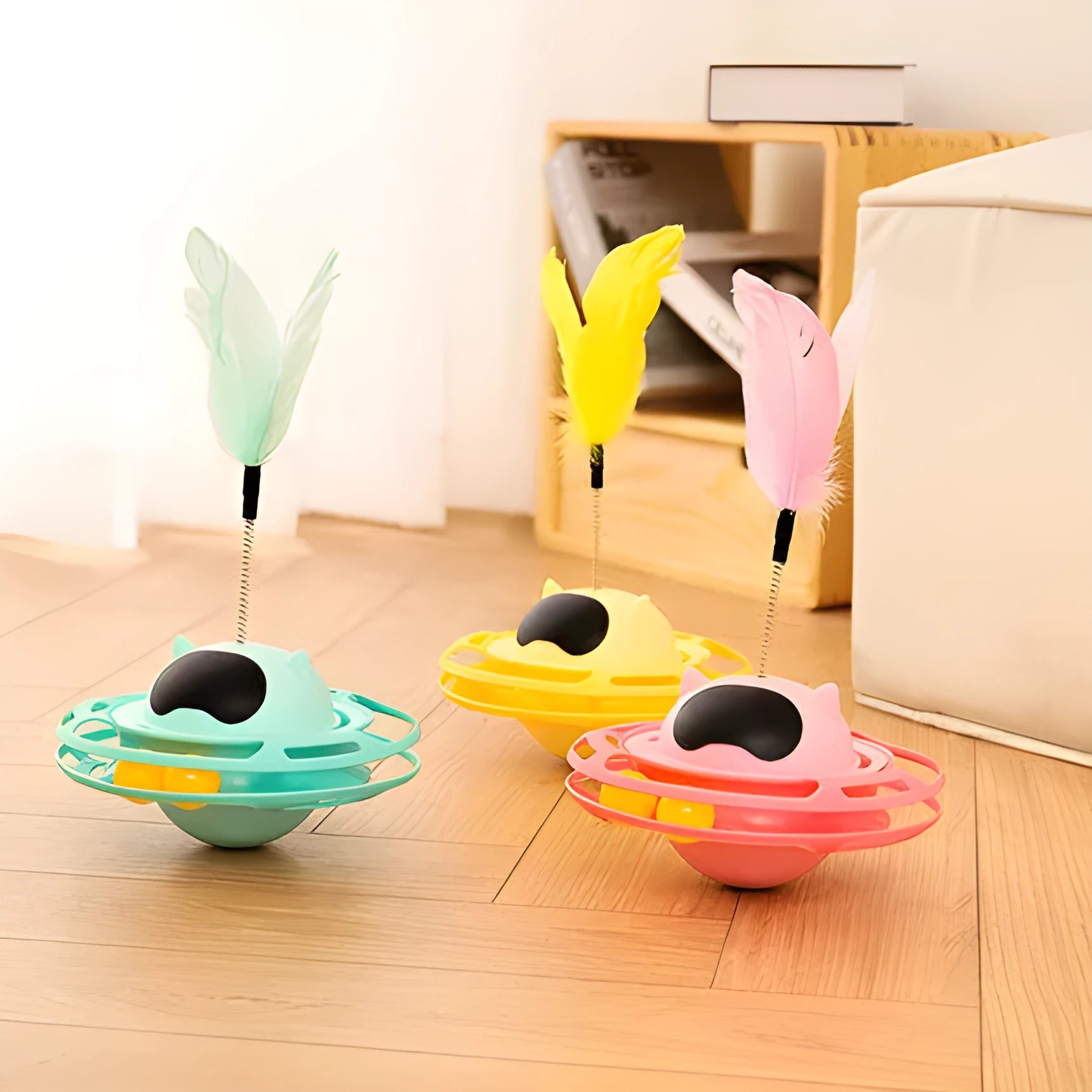Pink cat tumbler turntable toy measuring 17cm tall with four play options