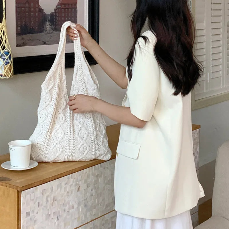 Retro hollow knitted shoulder tote bag in polyester with crochet design showing double straps and large capacity