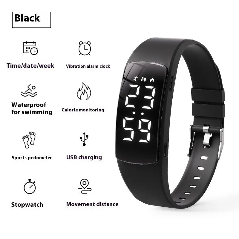 Black vibration alarm smart watch with LED display and silicone strap on a wrist.