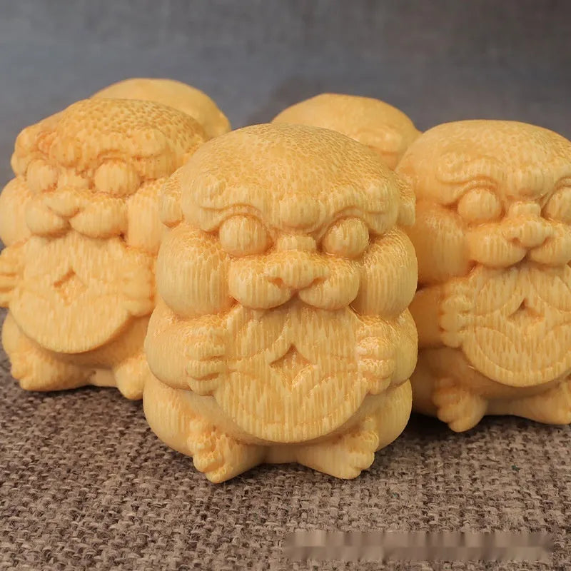 Solid bamboo carving ornament in take money coin shape showing natural wood grain