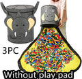 Green felt cube storage bag with pull rope serving as toy organiser and play mat
