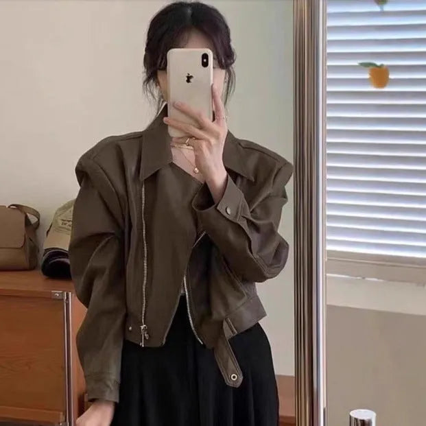 Women's retro slim fit imitation leather jacket in black with pocket detail, 40cm length
