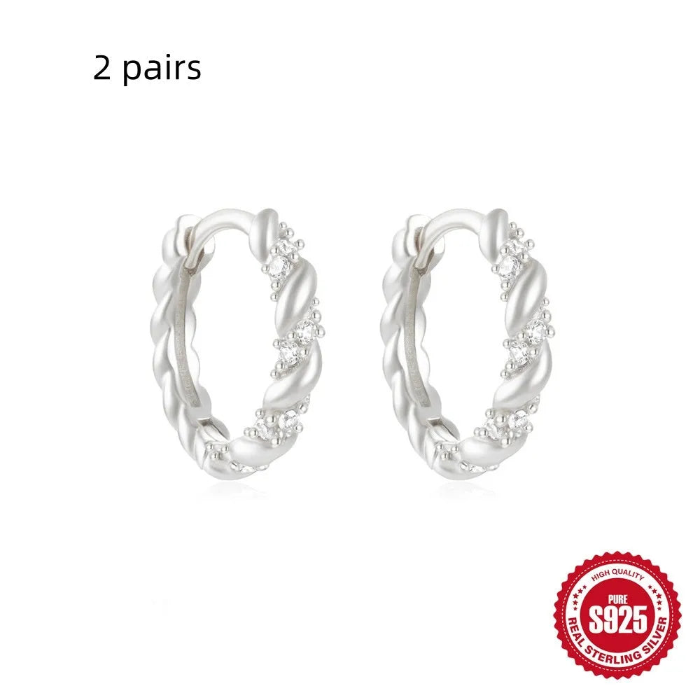 Sterling silver geometric stud earrings with small round diamond accent in gold or silver finish
