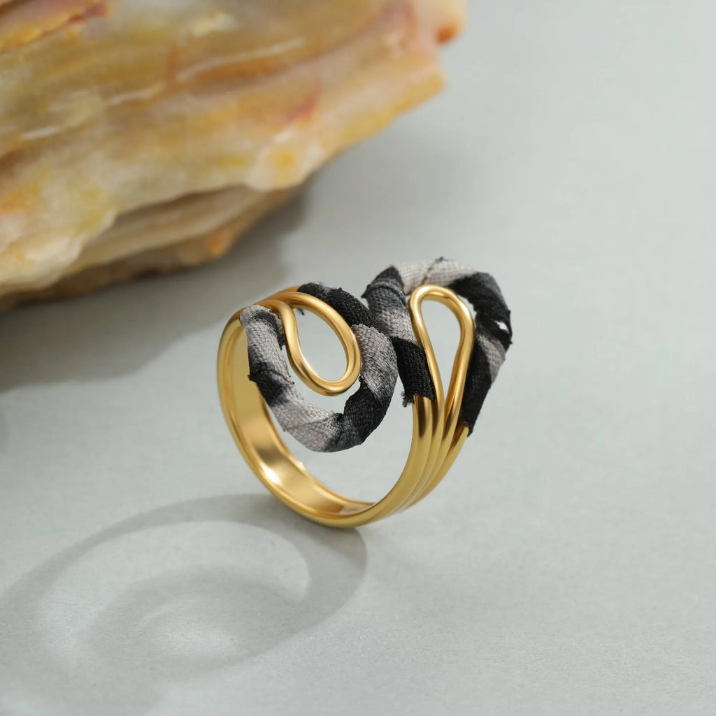 Geometric leopard print open mouth ring in stainless steel with heart shape design