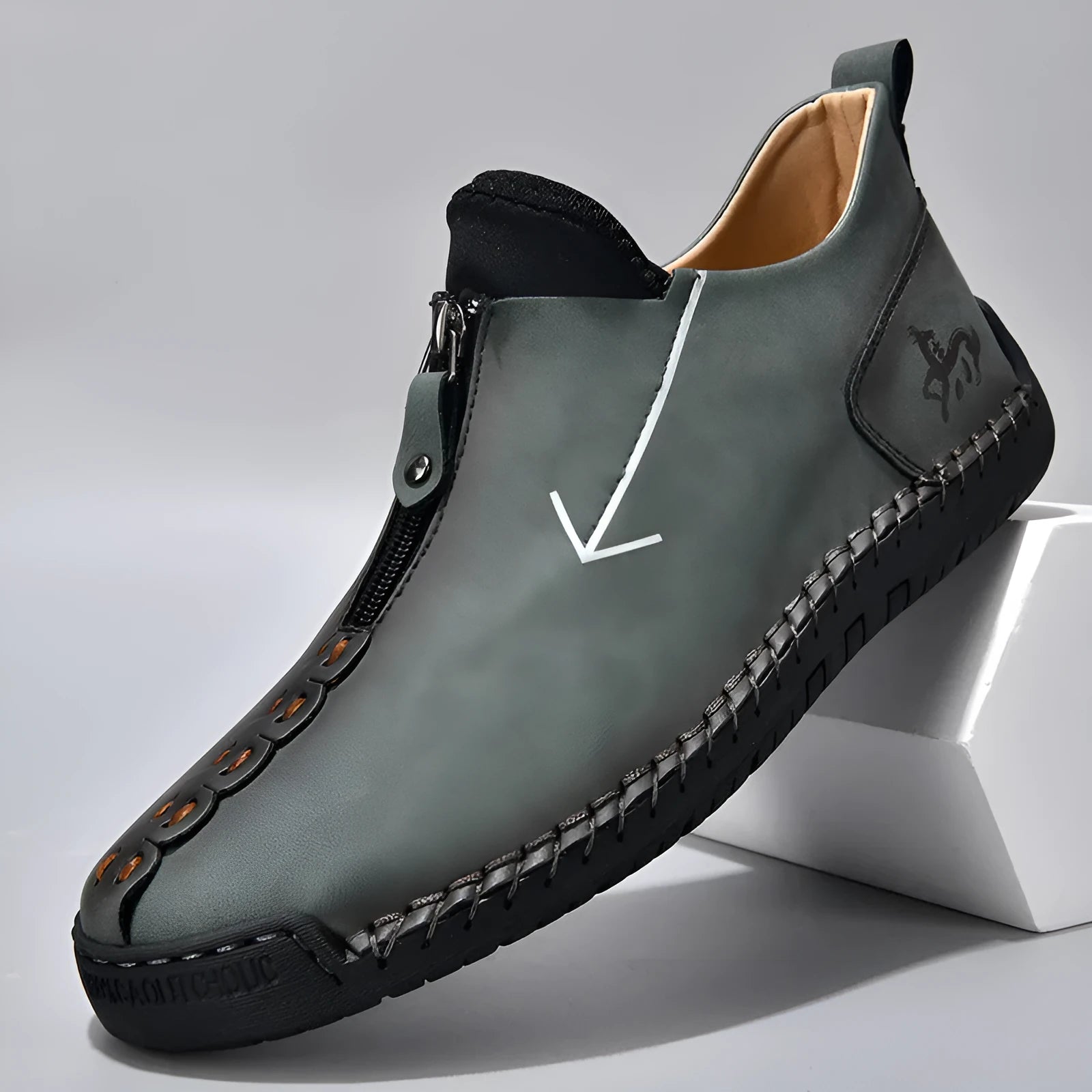 Men's brown leather-look zip-up martin boots with a round toe and rubber sole on a white background.