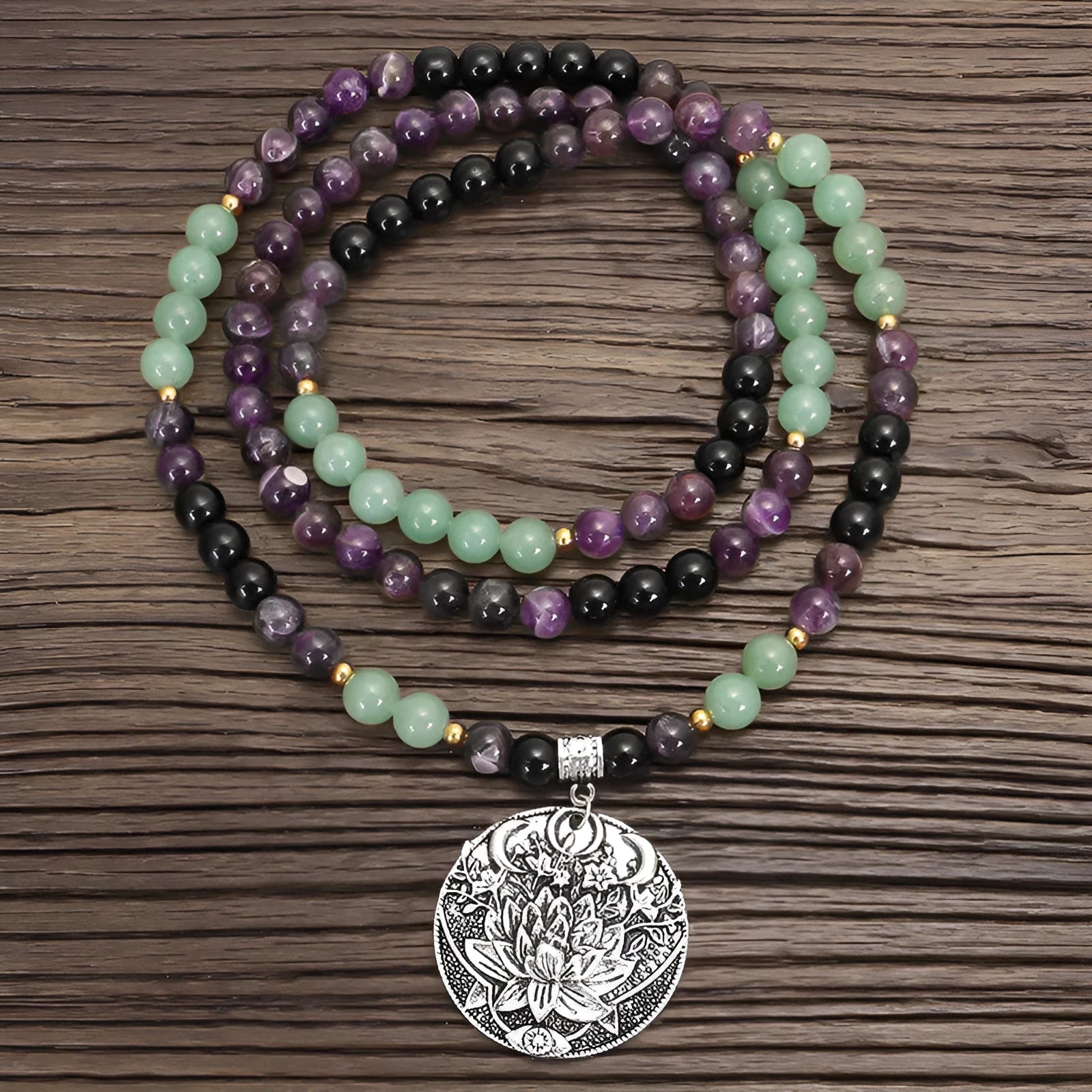Dongling long yoga lotus pendant necklace and bracelet set with geometric alloy pendant and stone beads.