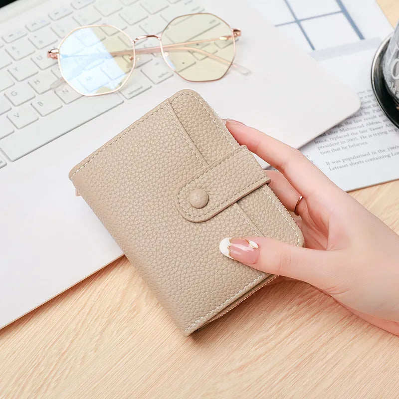 Ladies' short wallet with lychee pattern in 2-fold PU design showing colour options