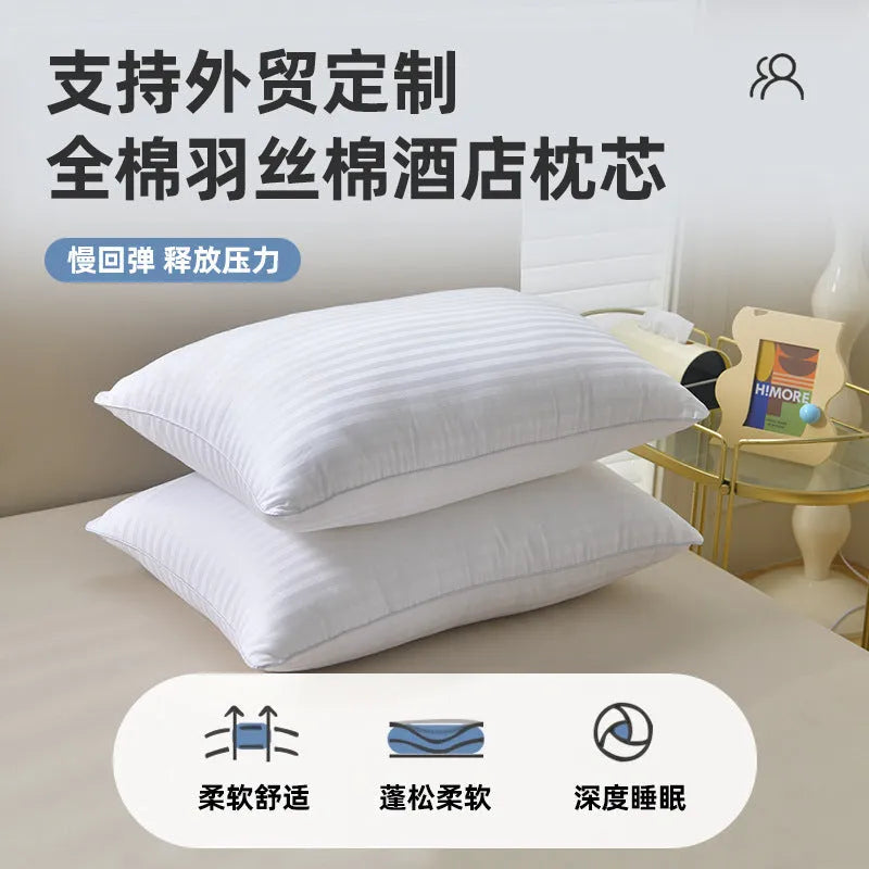 White hotel cotton satin stripe pillow with feather and cotton filling on a bed.