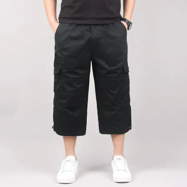 Man wearing loose khaki cotton cropped pants for sports
