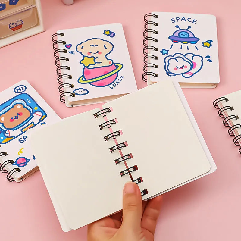 Astronaut themed pocket flipper notebook measuring 10.5 by 8 centimetres