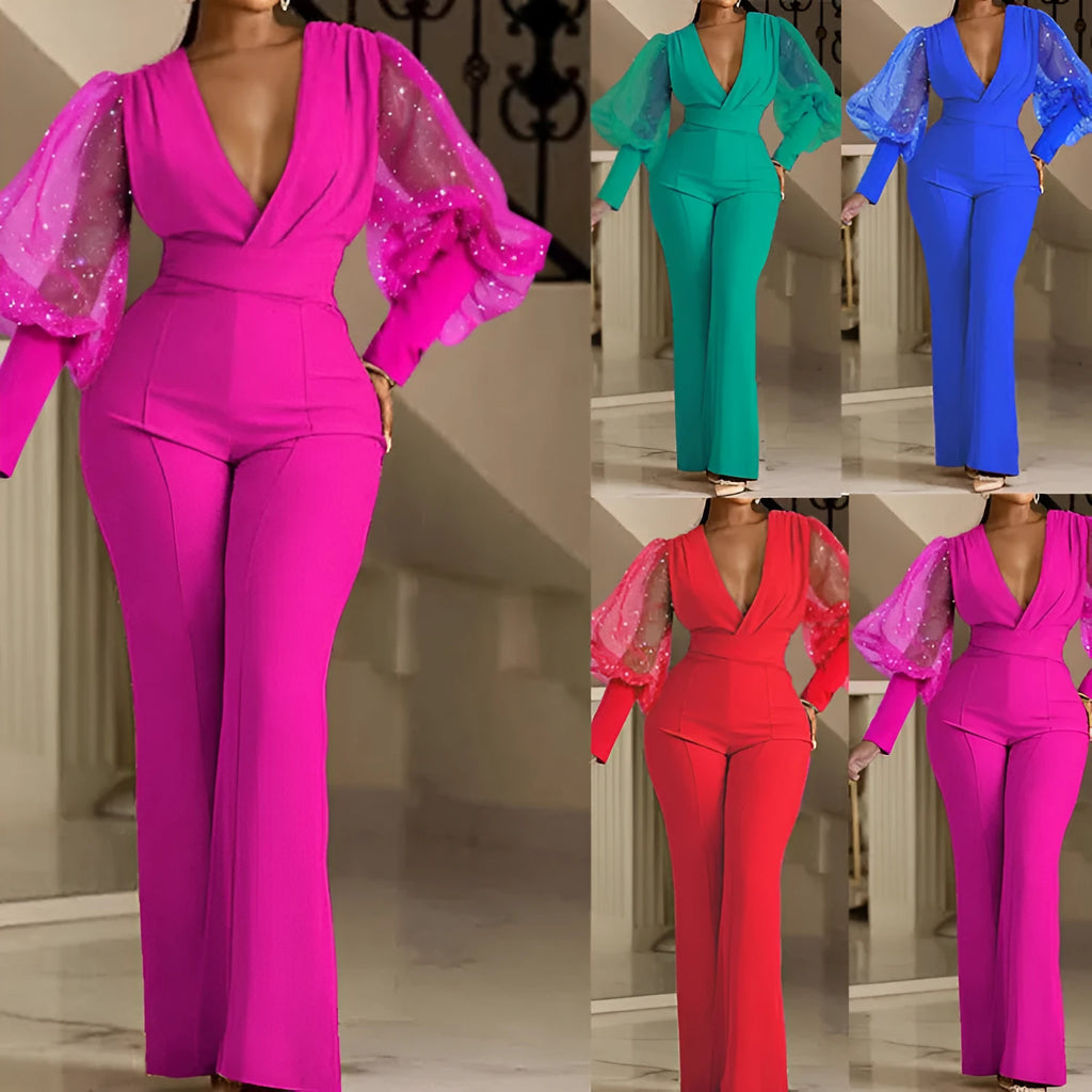 Red women's long sleeve jumpsuit with mesh stitching detail, elastic waist, and wide leg trousers.