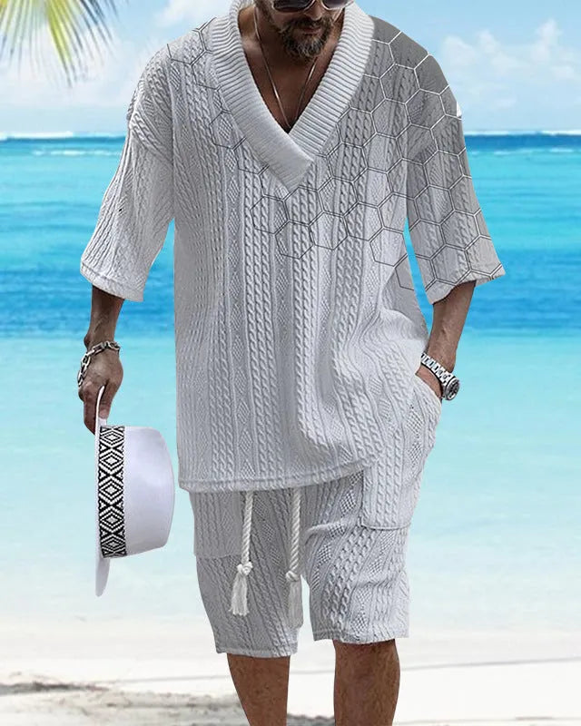 Men's knitted short-sleeved top and matching shorts in a solid colour, showing relaxed drop-shoulder fit.