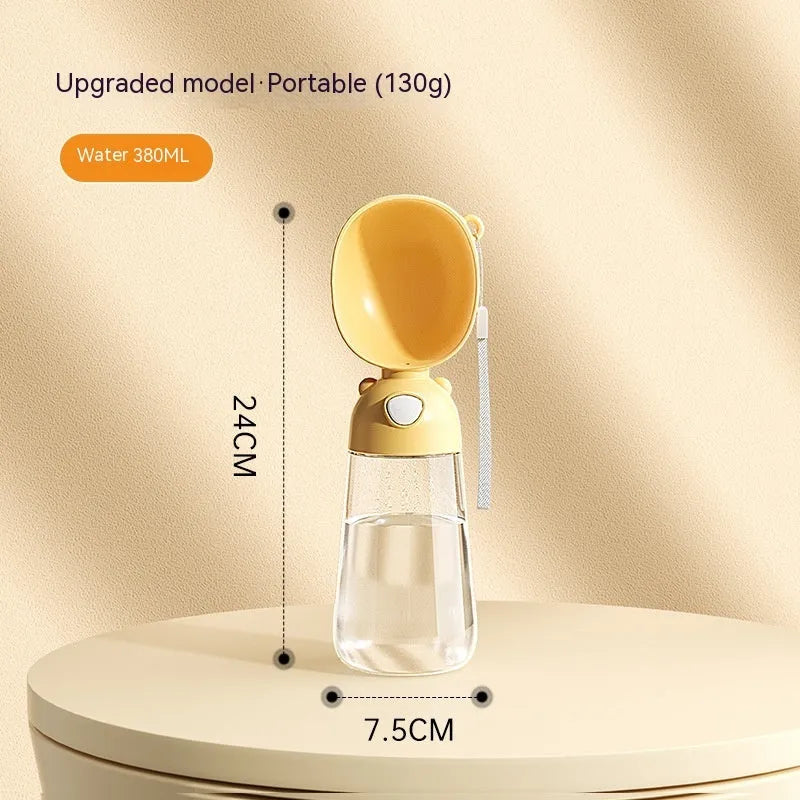 Portable dog water bottle and food container in yellow colour for outdoor pet travel
