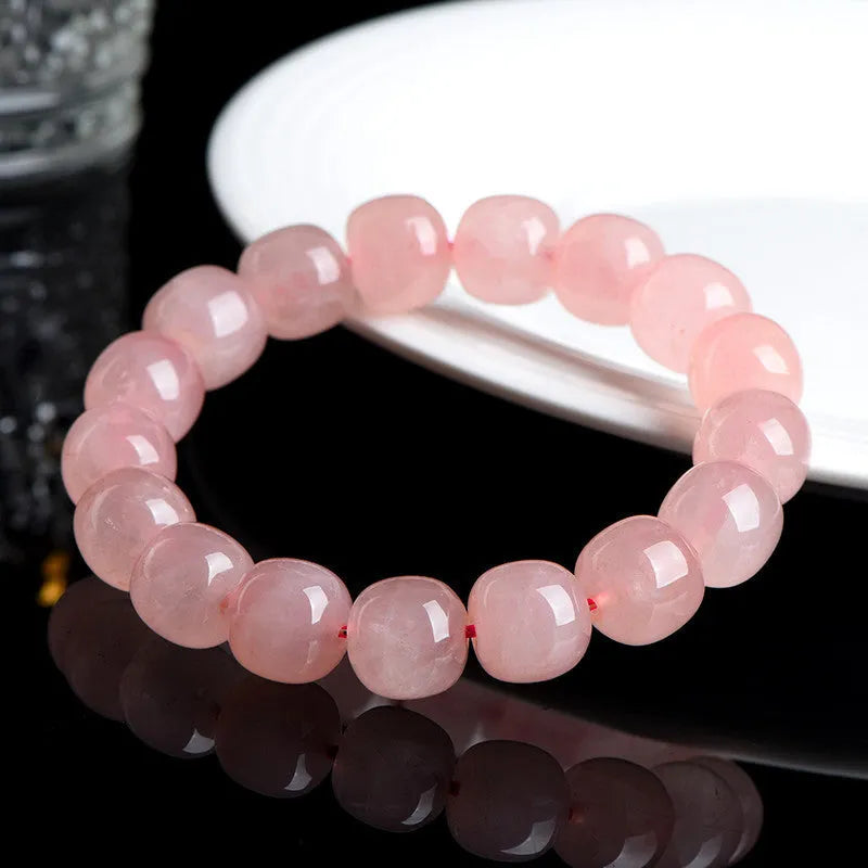 Pink crystal barrel bead bracelet with geometric shaped 8-10mm beads