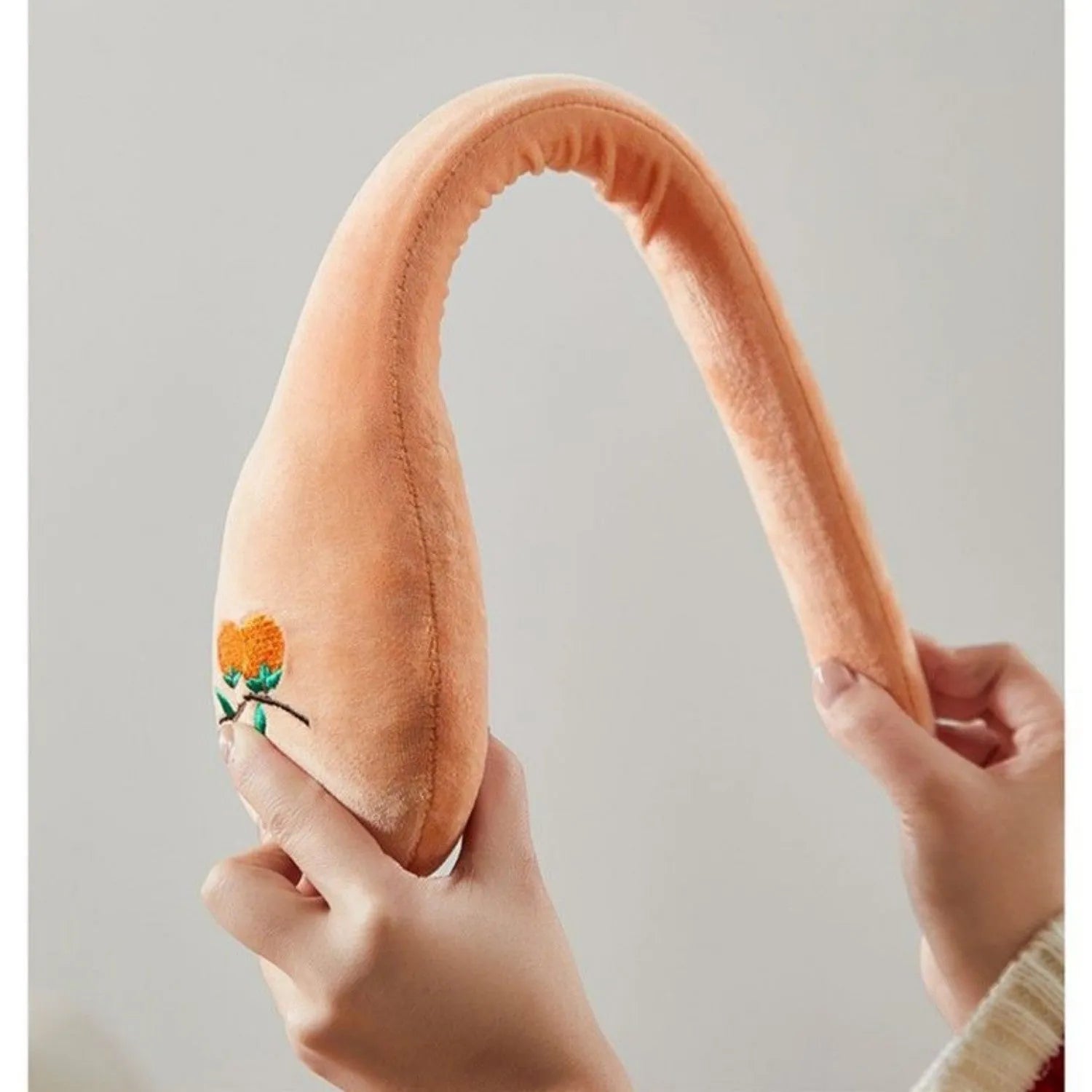 48 cm long manual massage stick with a zipper style design and a meridian flap for percussion therapy.