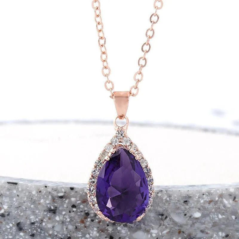 Rose gold pink drop shape women's necklace with geometric rhinestone detailing and alloy construction
