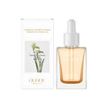 30ml amber glass bottle of brightening and firming facial oil with dropper applicator