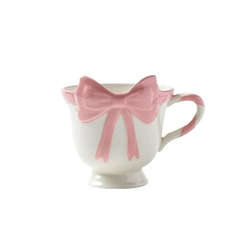 Ceramic heart bow mug with 301-400ml capacity in black pink or white powder colour
