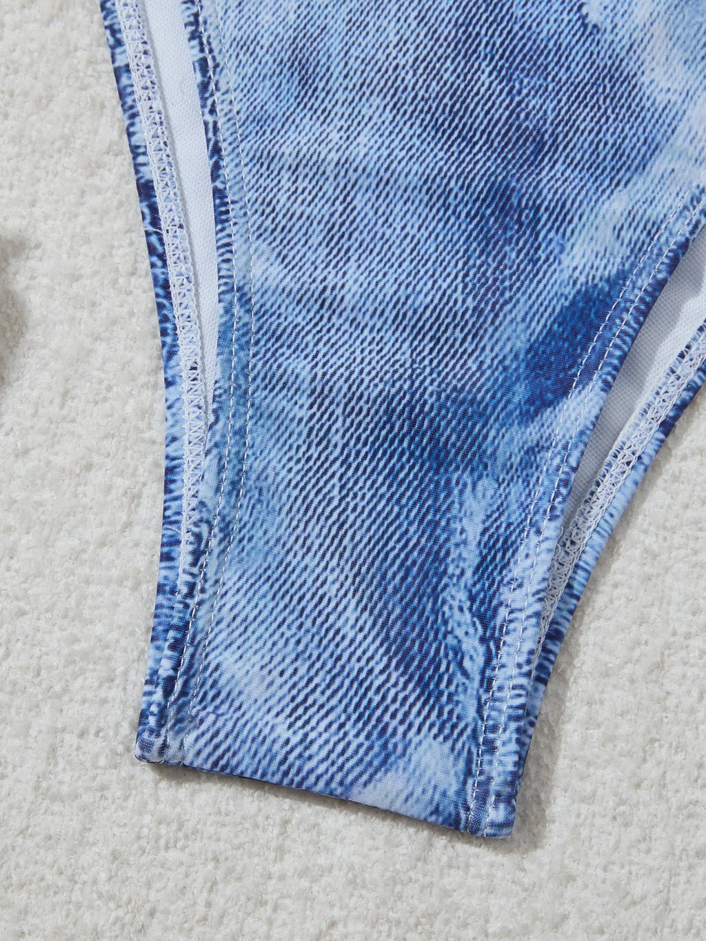 Women's denim blue printed bikini set with strap design showing front and back views